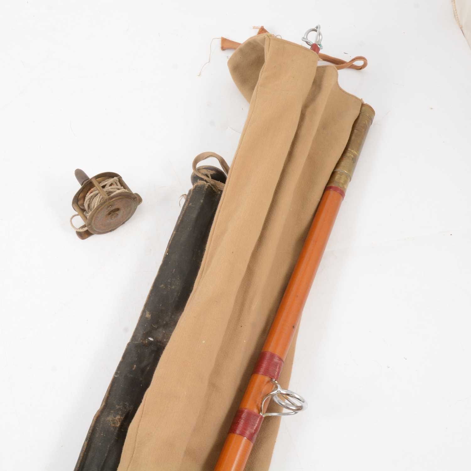 Lot 171 - Castaway fishing rod, two piece cane rod and a small brass reel