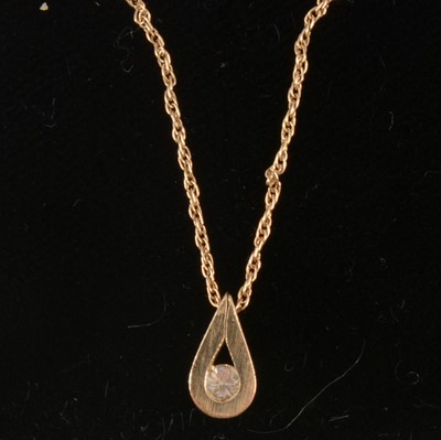 Lot 339 - A small diamond pendant on Prince-of-wales link chain.