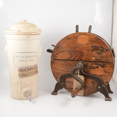 Lot 107 - George Kent oak and iron knife sharpener, and a stoneware water filter