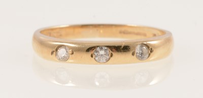 Lot 320A - A 9 carat yellow gold ring set with cubic zirconia.