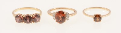 Lot 295 - Gemporia - Three zircon set rings in 9 carat yellow gold.