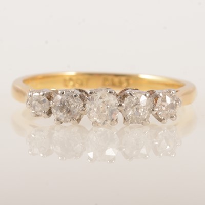 Lot 287 - A diamond five stone ring.