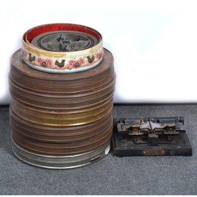 Lot 136 - Seven film reel-to-reel films, in metal cases, including 'Romance of Foreign Legion'