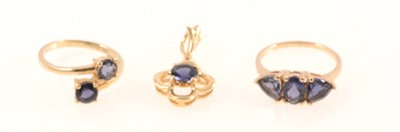 Lot 294 - Gemporia - Two Bengal iolite rings and a Bengal iolite pendant.