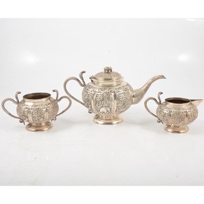 Lot 274 - An Indian silver-plated three piece teaset.