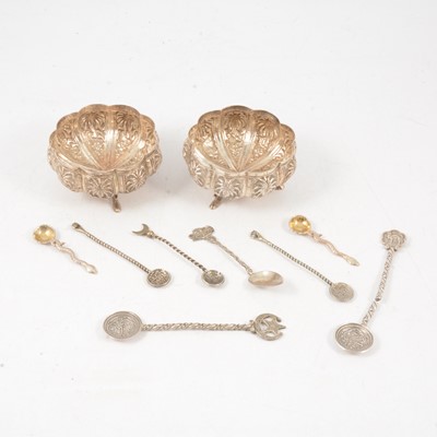 Lot 241 - Pair of Indian white metal salts and collection of salt spoons.