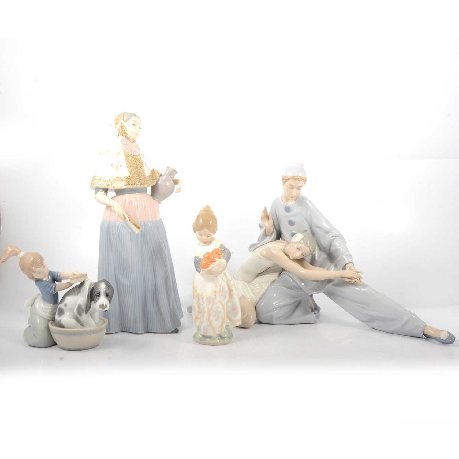 Lot 38 - Four Lladro figurines.