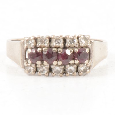 Lot 305 - A ruby and diamond ring, 18 carat white gold.