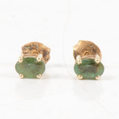 Lot 325 - A pair of emerald stud earrings for pierced ears.