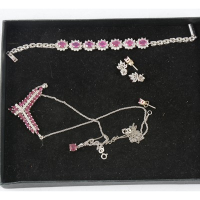 Lot 177 - A collection of ruby jewellery set into silver.