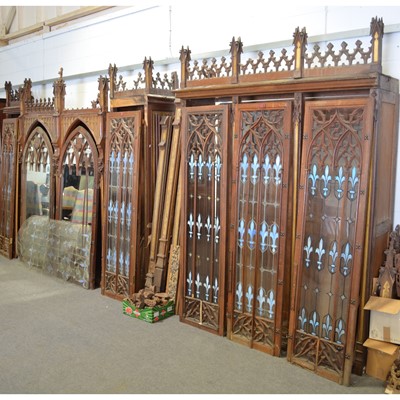 Lot 635 - Bedel & Cie, Paris, gothic revival oak bookcases and panelling