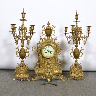 Lot 165 - Three-piece mantel garniture and a pair of candelabra.