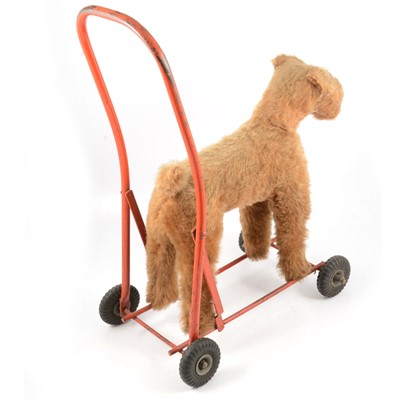 Lot 170 - International Model Aircraft ltd, Tri-ang push-a-long dog toy on wheels and steel stand.