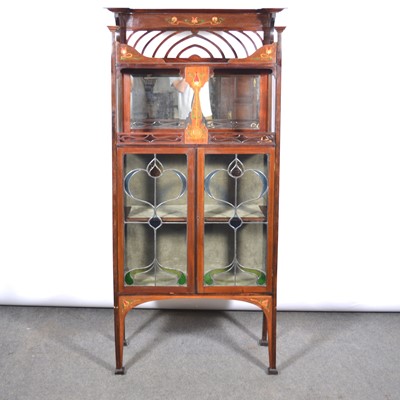 Lot 560 - An English Art Nouveau cabinet, in the manner of Shapland and Petter of Barnstaple