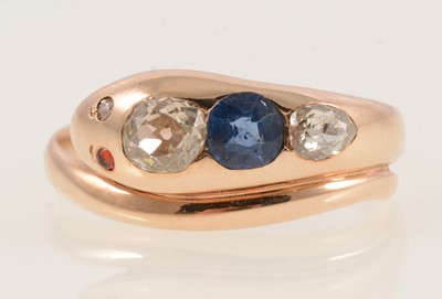 Lot 287 - A sapphire and diamond snake ring.