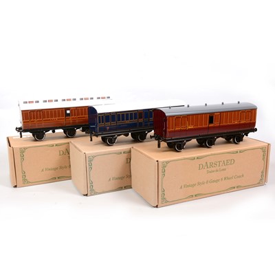 Lot 196 - Two Darstaed Trains De Luxe O gauge passenger coaches, three 6-wheel coaches
