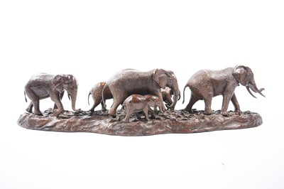 Lot 127 - Donald Greig (South African), Family of Elephants crossing the desert