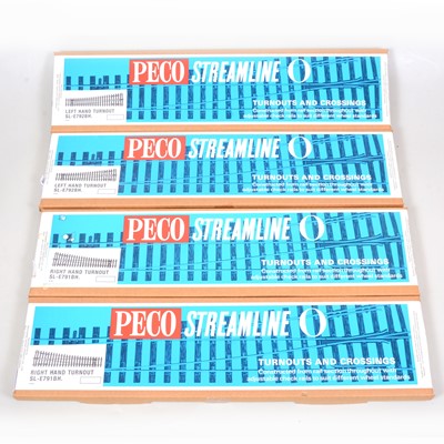 Lot 214 - Four Peco O gauge model railway turnout points.