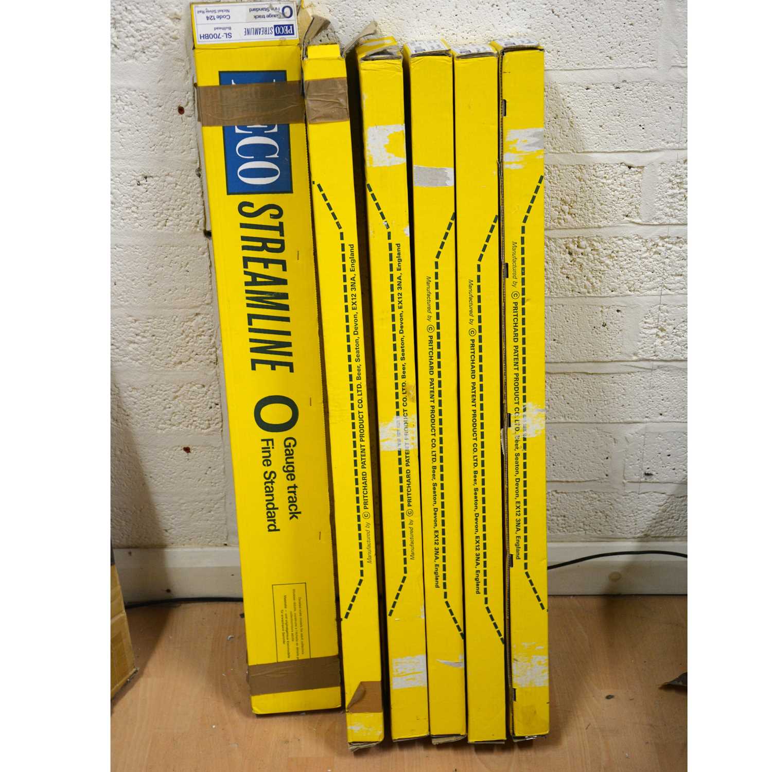 Lot 216 - Peco Streamline O gauge model railway track, six-packs of twelve SL-700BH track.