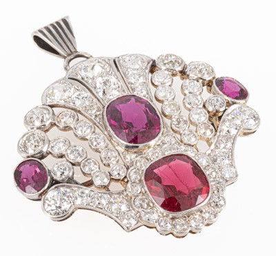 Lot 87 - An Edwardian style ruby, red spinel and diamond brooch/pendant.
