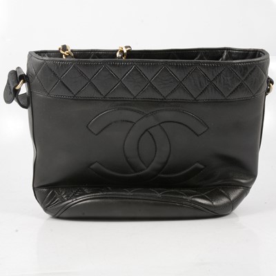 Lot 234 - Chanel - a lady's 1960's vintage black leather handbag.