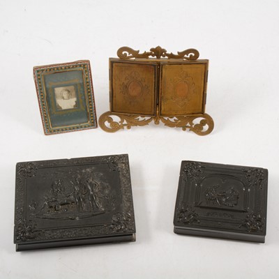Lot 214 - Two Victorian cased daguerreotype in carved jet style cases, a gilt framed triptych.