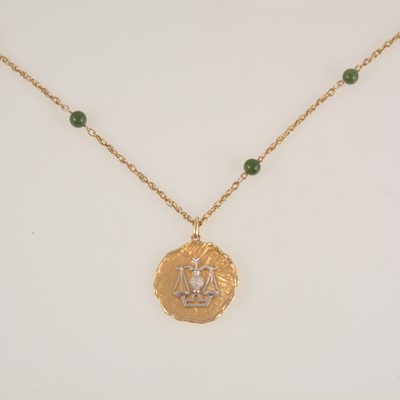 Lot 277 - A Libra zodiac pendant on Prince-of-Wales link chain with green jadeite beads.