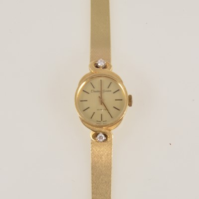 Lot 313 - Creation Geneve - a lady's quartz 585 standard bracelet watch