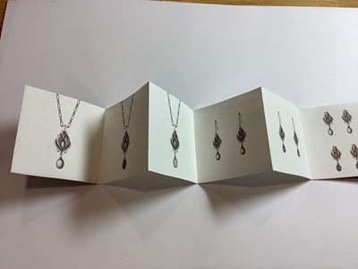 Lot 377 - A Georg Jensen pendant and a Matthew Horner pendant.
