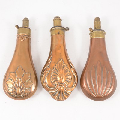 Lot 144 - Three brass and copper shot flasks