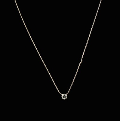 Lot 118 - A diamond single stone pendant and chain.