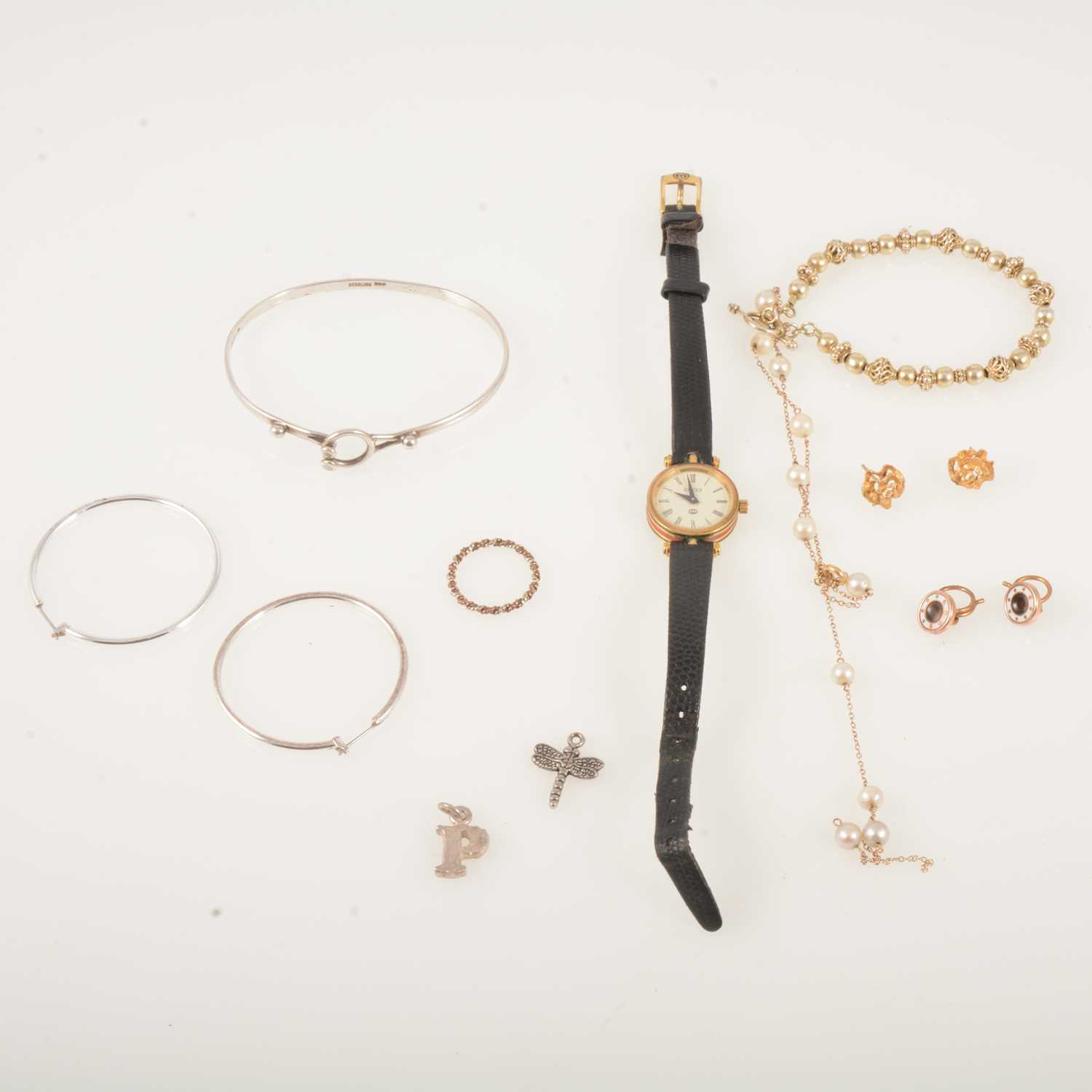 Lot 381 - A Gucci wrist watch, silver jewellery, broken 9 carat gold signet ring.