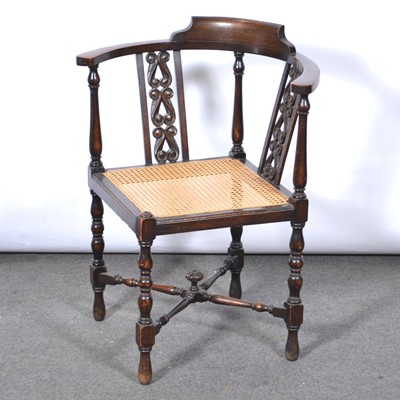 Lot 549 - Edwardian oak corner chair.