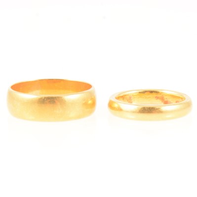 Lot 316 - Two 22 carat yellow gold wedding bands.