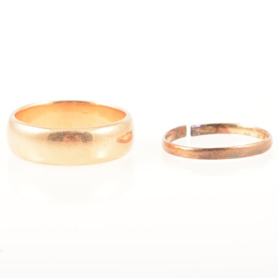 Lot 317 - An 18 carat yellow gold wedding band and one other.