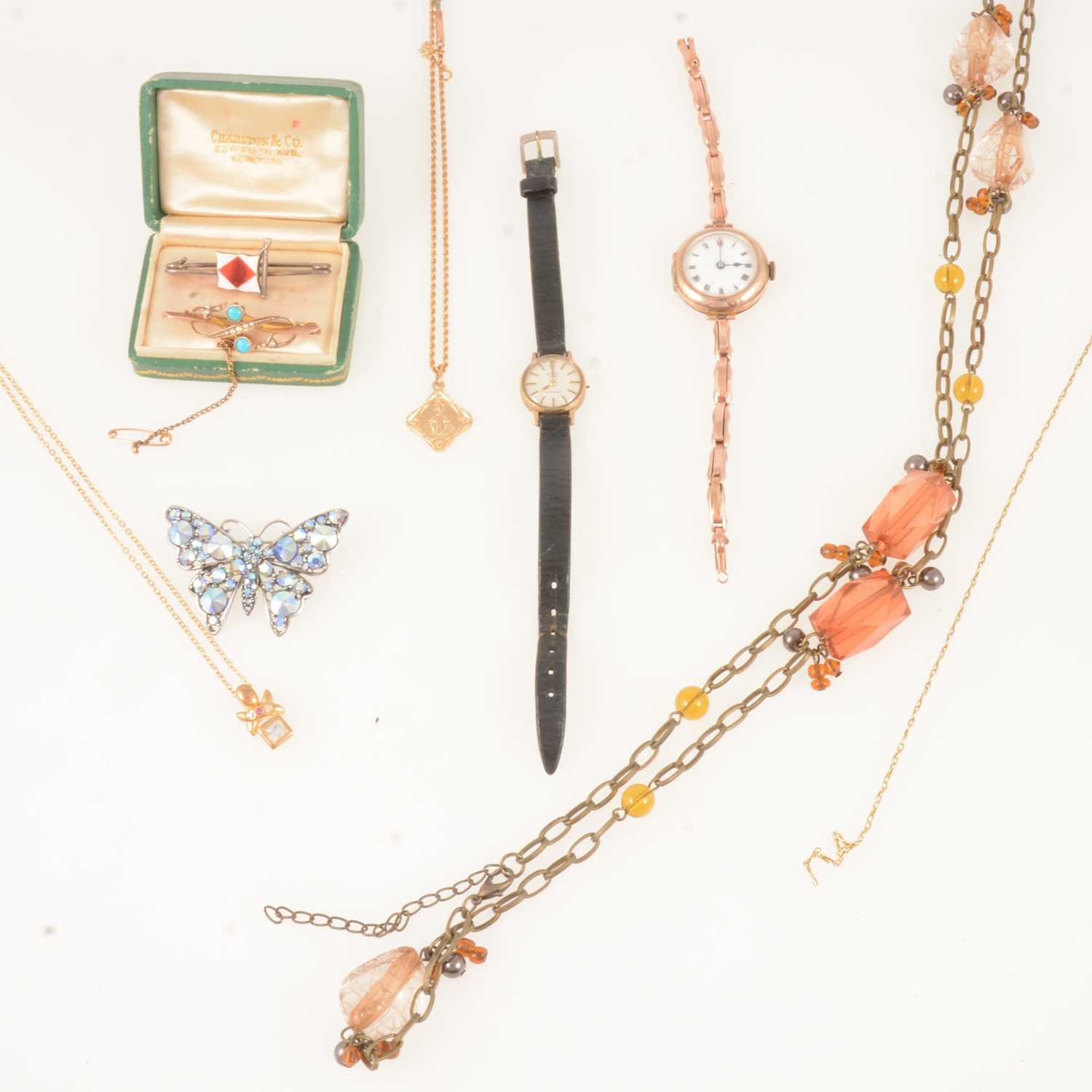 Lot 385 - Two gold wristwatches, bar brooch, twisted rope link chain, New York box, naval badge.