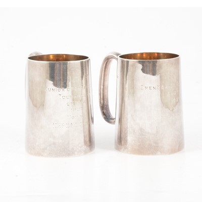 Lot 276 - Two silver presentation mugs