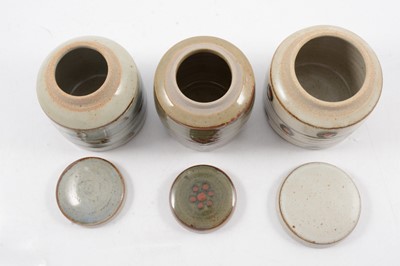 Lot 1044 - David Leach, three Lowerdown Pottery preserve jars and covers