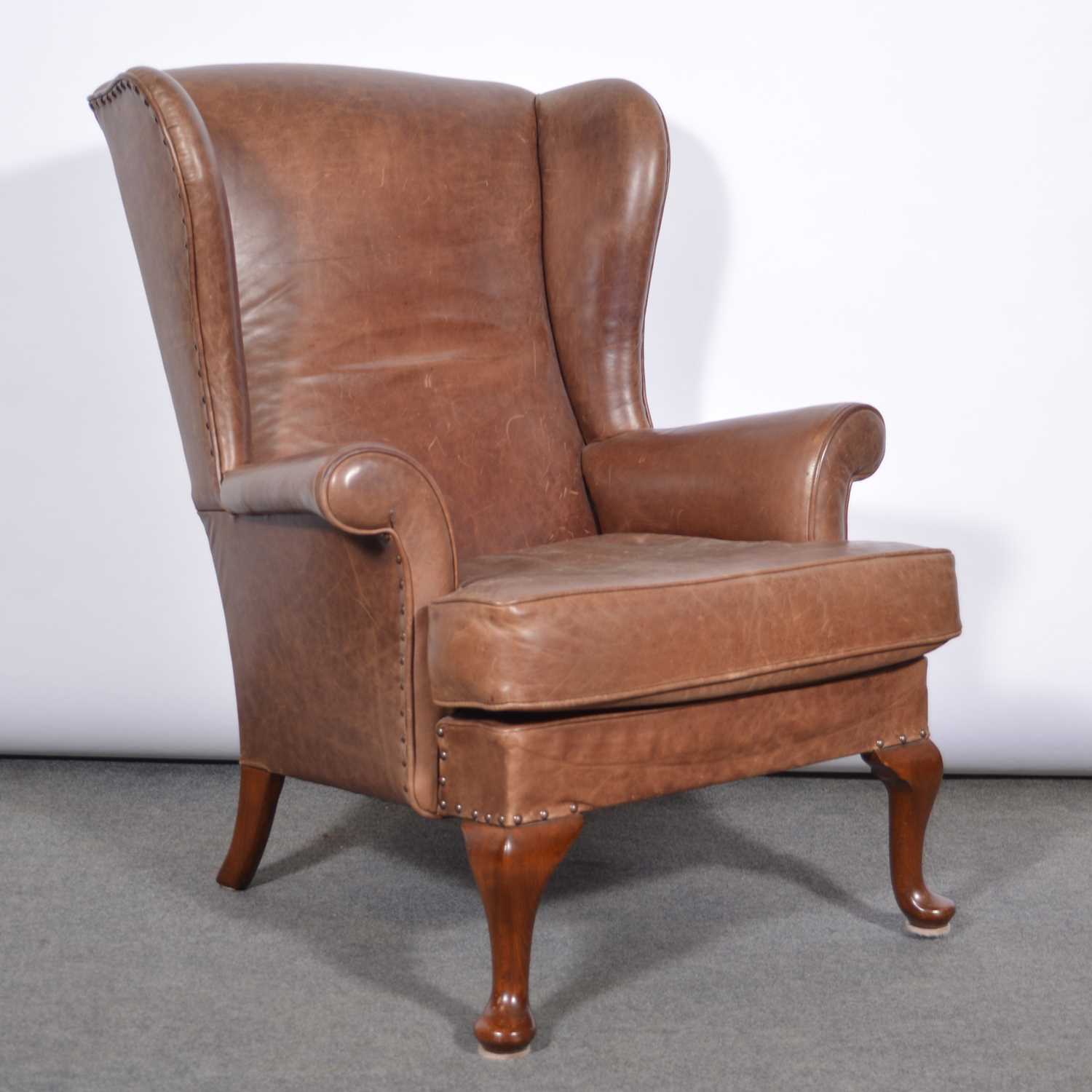 Lot 593 - Parker Knoll leather covered armchair.