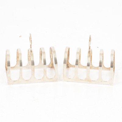 Lot 137 - A pair of small silver toast racks, Wilson & Sharp, Birmingham 1936.