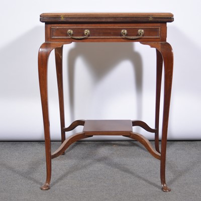 Lot 561 - Edwardian mahogany envelope-top card table