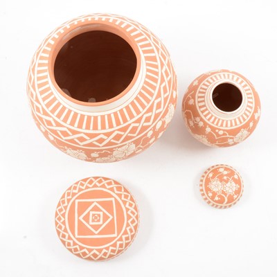 Lot 1031 - Two terracotta and sgraffito ginger jar and covers by Peter and Gaye Fishley Holland