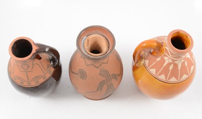 Lot 1032 - Three terracotta and sgraffito vessels by William and Gaye Fishley Holland
