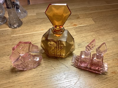 Lot 127 - Two trays of vintage scent bottles and atomisers, a collectors' book and a spill vase.