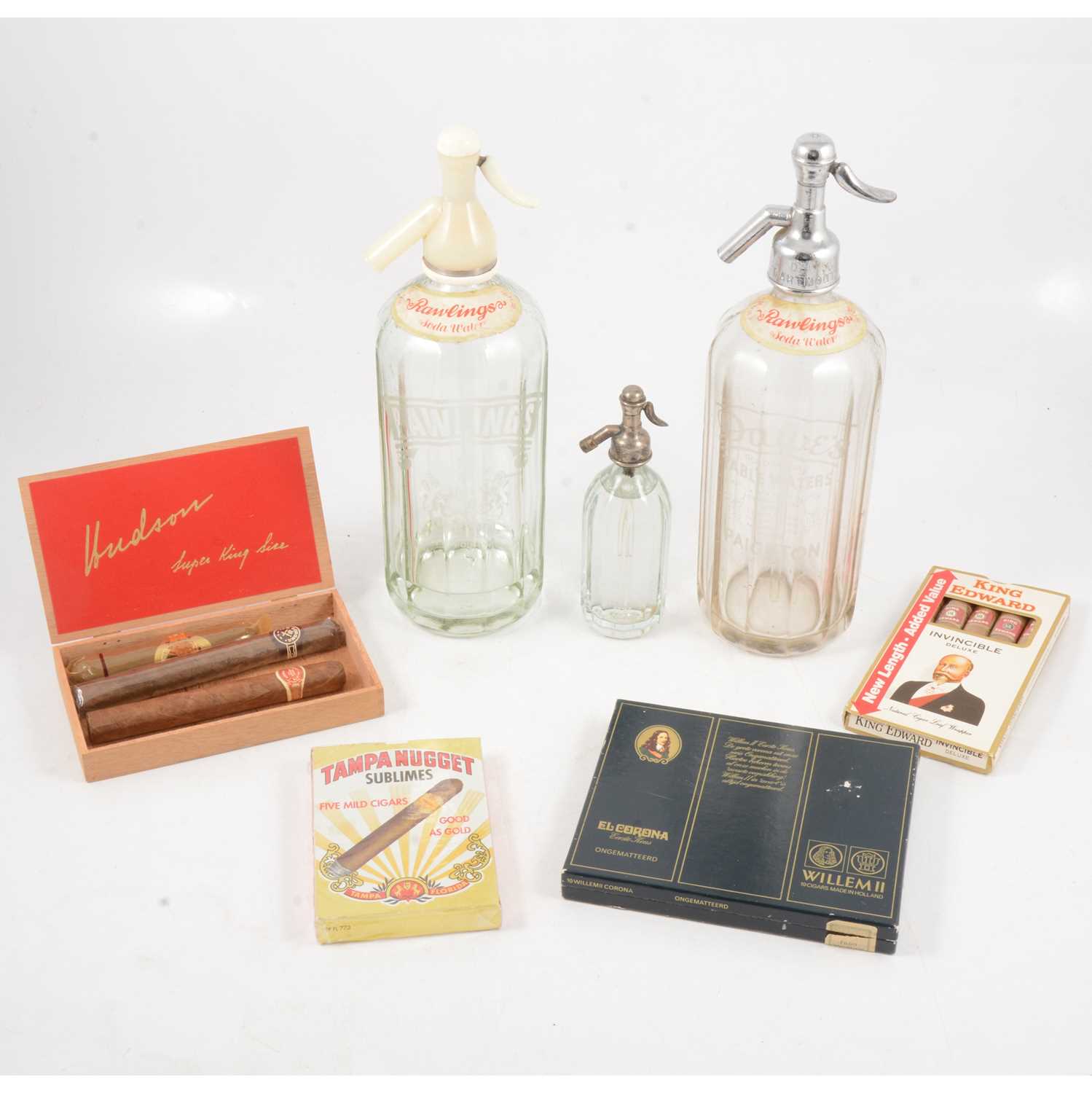 Lot 106 - Three soda syphons and a quantity of cigars