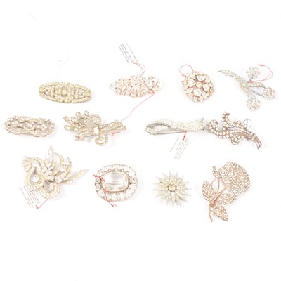 Lot 402 - Twelve vintage clear paste set brooches.