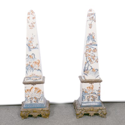 Lot 43 - Pair of reproduction obelisks and a stick stand