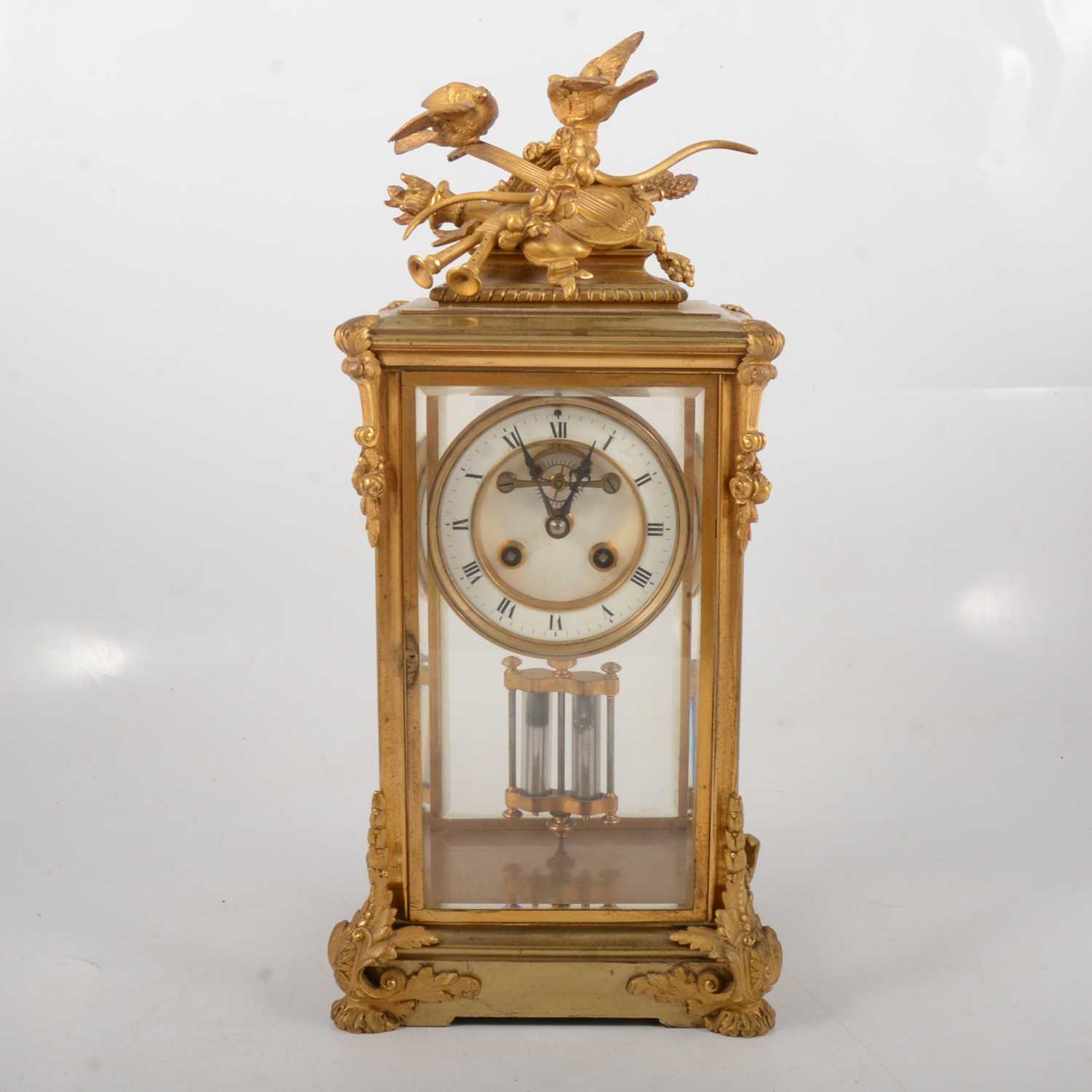 Lot 72 - French gilt metal four-glass mantal clock