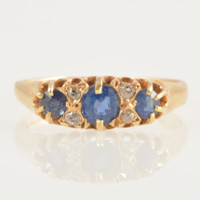 Lot 237 - A Victorian sapphire and diamond half hoop ring.