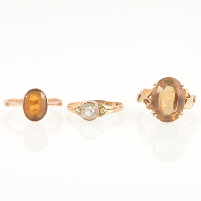 Lot 236 - Three gem set rings.